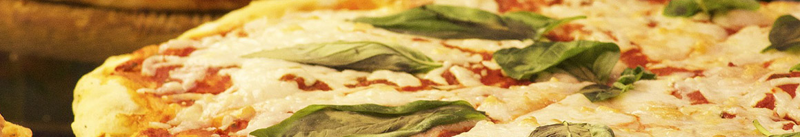 Eating Pizza Steakhouse at Jakers Bar and Grill restaurant in Missoula, MT.